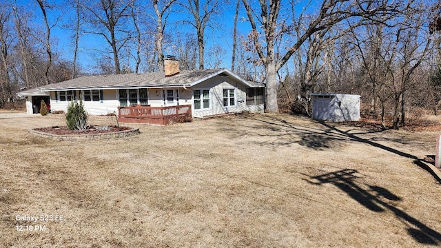 755 Brickley Dr, Fontana, WI 53125 - rear view of house featuring dirt driveway, a porch, and a chimney