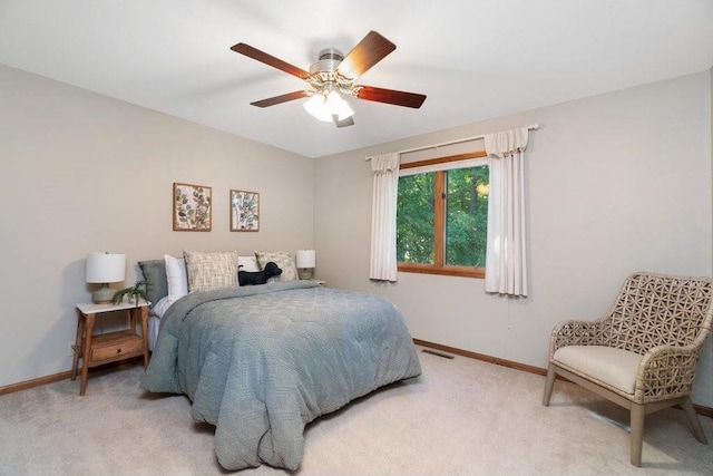 3921 Damon Ct, Eau Claire, WI 54701 - bedroom featuring visible vents, light colored carpet, baseboards, and ceiling fan