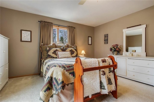 1229 W Beltline Rd, Spring Valley, WI 54767 - carpeted bedroom featuring baseboards and a ceiling fan