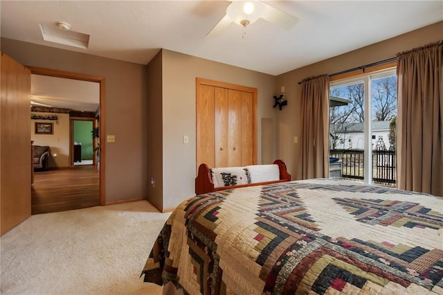1229 W Beltline Rd, Spring Valley, WI 54767 - carpeted bedroom featuring access to exterior, ceiling fan, and a closet