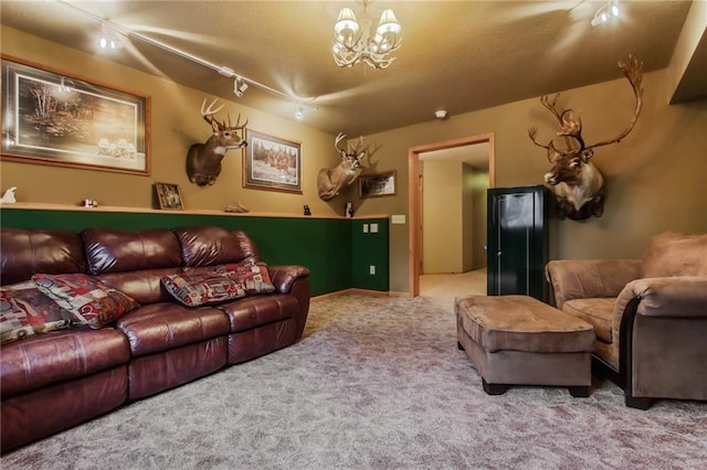 1229 W Beltline Rd, Spring Valley, WI 54767 - living room with carpet, a notable chandelier, a textured ceiling, and track lighting