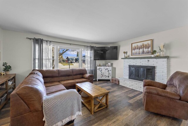 311 Blue View Dr, Mount Horeb, WI 53572 - living room featuring a fireplace and dark wood-type flooring