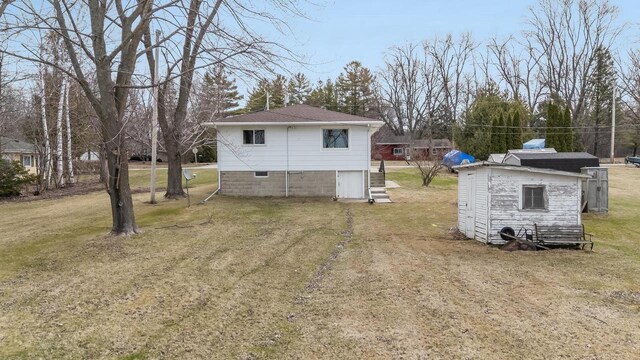 6671 Lasley Shore Dr, Winneconne, WI 54986 - exterior space with a lawn