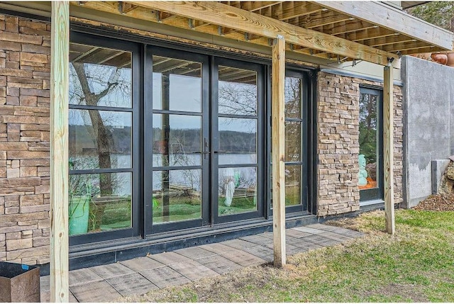 1020 Lake St, Prescott, WI 54021 - view of exterior entry featuring a water view and stone siding