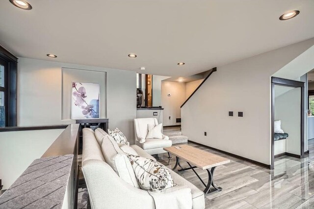 1020 Lake St, Prescott, WI 54021 - living room with baseboards, stairway, and recessed lighting