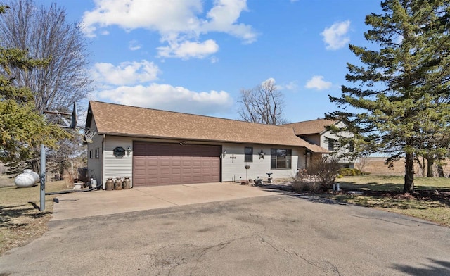 4208 County Road Z, Oshkosh, WI 54904 - single story home with concrete driveway, a shingled roof, and an attached garage