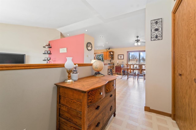 4208 County Road Z, Oshkosh, WI 54904 - hall featuring baseboards, lofted ceiling, and light floors