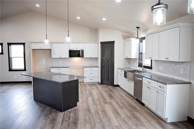 17297 109th Ave, Chippewa Falls, WI 54729 - kitchen with a sink, appliances with stainless steel finishes, stone counters, light wood-style flooring, and lofted ceiling
