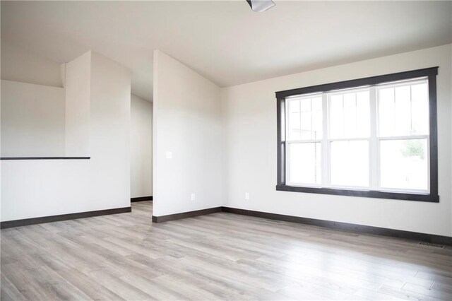 17297 109th Ave, Chippewa Falls, WI 54729 - spare room featuring light wood finished floors and baseboards
