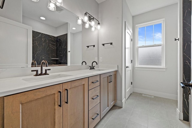 743 Brockway Dr Unit Lt37, Mukwonago, WI 53149 - bathroom with double vanity, tile patterned flooring, baseboards, and a shower