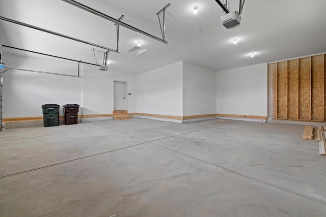 743 Brockway Dr Unit Lt37, Mukwonago, WI 53149 - garage with a garage door opener and baseboards