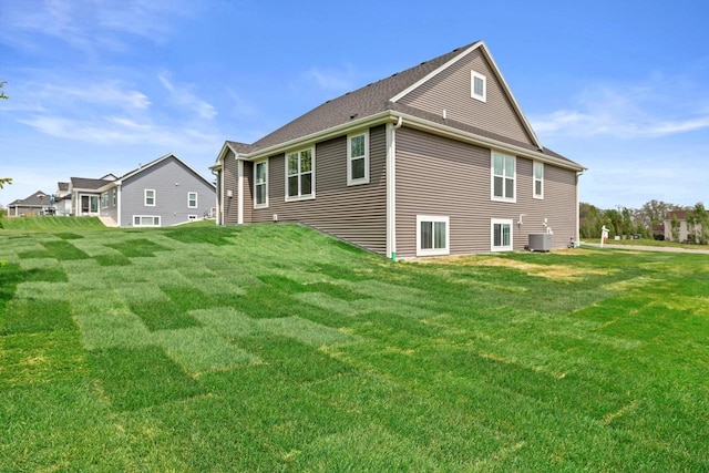 743 Brockway Dr Unit Lt37, Mukwonago, WI 53149 - back of property with a yard and cooling unit