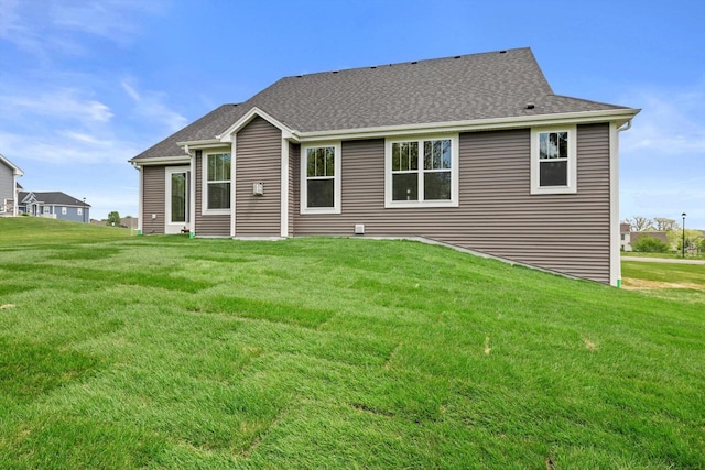 743 Brockway Dr Unit Lt37, Mukwonago, WI 53149 - rear view of house featuring a yard and roof with shingles