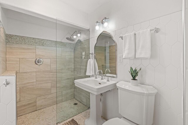 full bathroom with a walk in shower and toilet