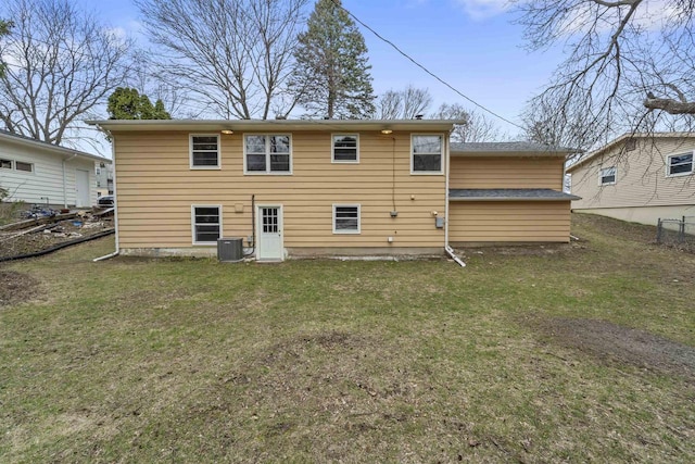 5221 Odana Rd, Madison, WI 53711 - rear view of house featuring cooling unit and a lawn