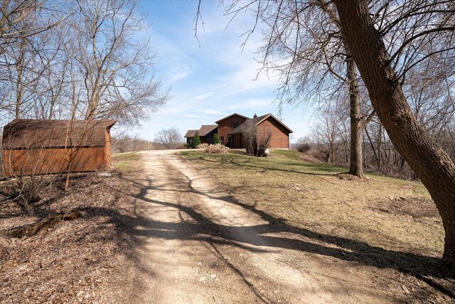 N8718 County Road Vv, Mindoro, WI 54644 - view of street featuring driveway