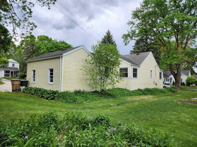 201 N Owen Dr, Madison, WI 53705 - view of property exterior featuring a lawn