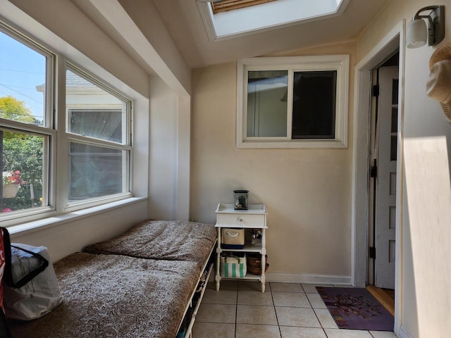 201 N Owen Dr, Madison, WI 53705 - bedroom with light tile patterned floors and baseboards