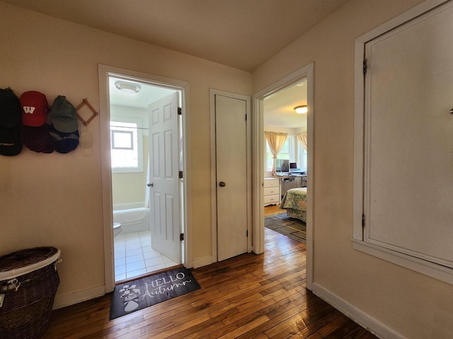 201 N Owen Dr, Madison, WI 53705 - corridor featuring hardwood / wood-style flooring, baseboards, and healthy amount of natural light