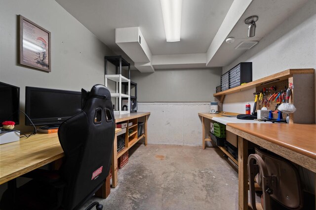 interior space with visible vents and a workshop area
