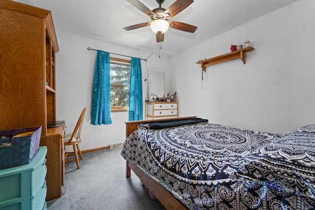 bedroom featuring carpet floors, baseboards, a ceiling fan, and visible vents