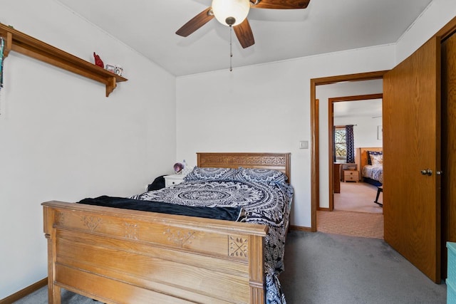bedroom featuring carpet, baseboards, and a ceiling fan