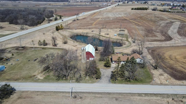 birds eye view of property featuring a rural view