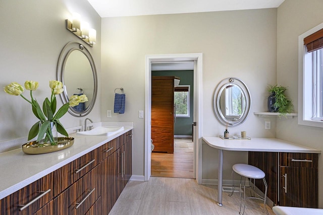 1105 Meadow Mist Rd, Middleton, WI 53562 - full bath featuring vanity, plenty of natural light, and baseboards