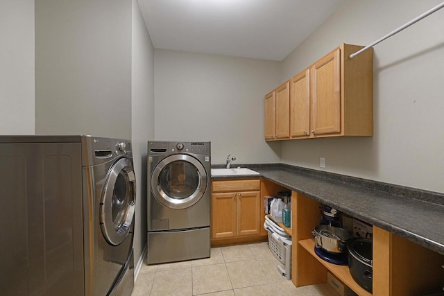 1105 Meadow Mist Rd, Middleton, WI 53562 - laundry room featuring a sink, cabinet space, light tile patterned flooring, and washing machine and dryer