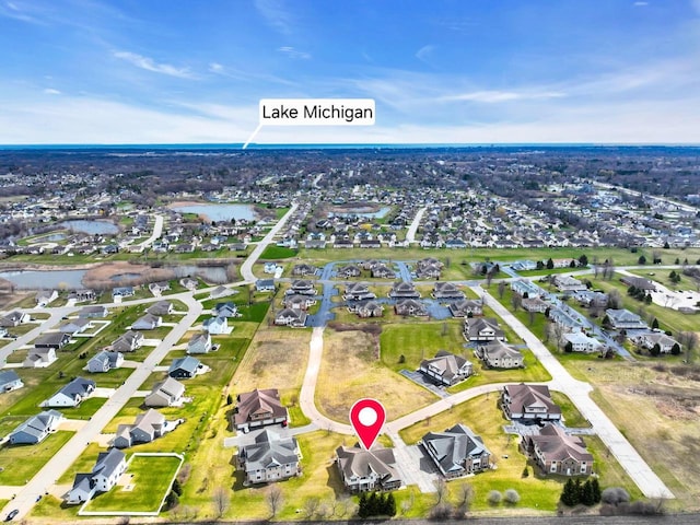 1734 Parkstone Ter Unit 73, Mount Pleasant, WI 53406 - drone / aerial view with a residential view and a water view
