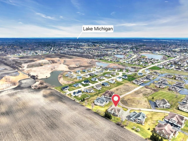 1734 Parkstone Ter Unit 73, Mount Pleasant, WI 53406 - drone / aerial view featuring a water view and a residential view