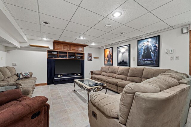 living room featuring recessed lighting, baseboards, a paneled ceiling, and light tile patterned floors