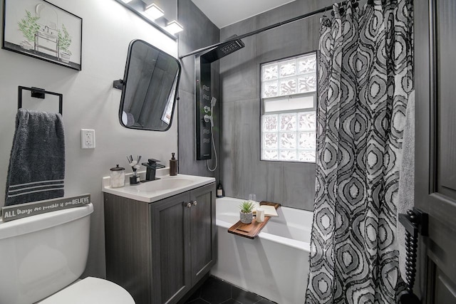 bathroom with toilet, shower / bathtub combination with curtain, vanity, and tile patterned flooring