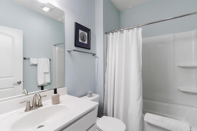 full bathroom featuring toilet and vanity