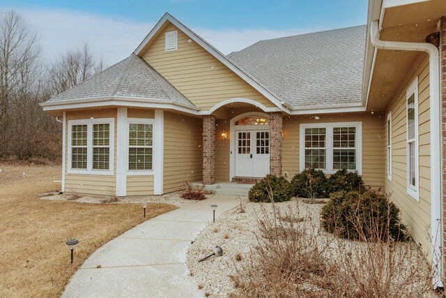 W209N11385 Reger Ct, Germantown, WI 53022 - view of front of property featuring roof with shingles