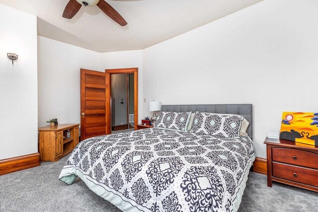 158 E Water St, Shullsburg, WI 53586 - carpeted bedroom with ceiling fan and baseboards