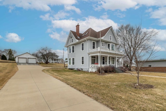 158 E Water St, Shullsburg, WI 53586 - view of home's exterior featuring a chimney, an outbuilding, a garage, a yard, and covered porch