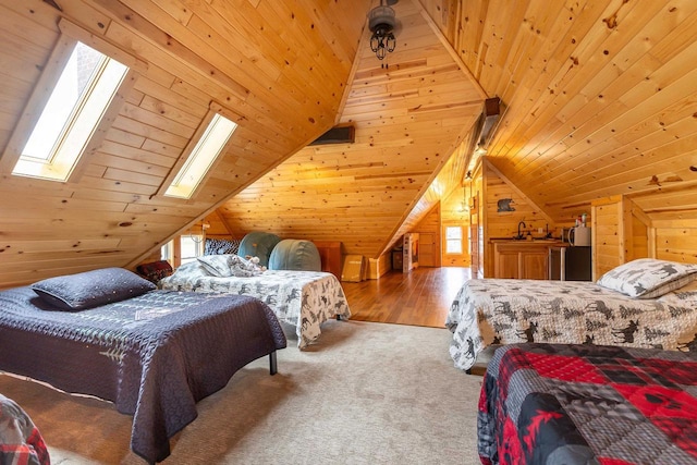 158 E Water St, Shullsburg, WI 53586 - bedroom featuring wood walls, multiple windows, wooden ceiling, and lofted ceiling with skylight