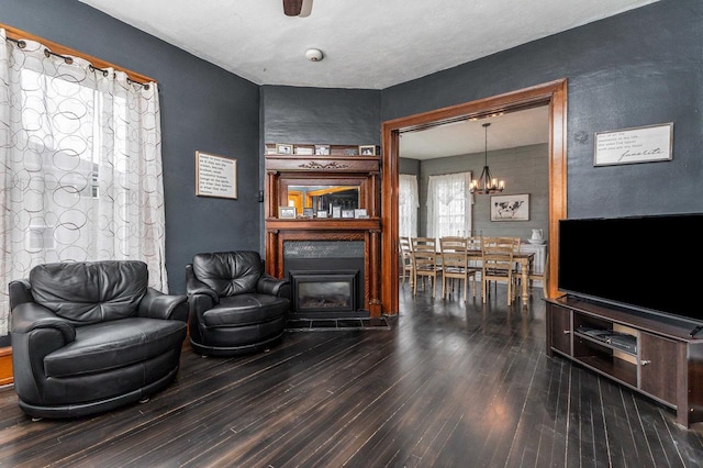 158 E Water St, Shullsburg, WI 53586 - interior space with a chandelier, dark wood finished floors, and a glass covered fireplace