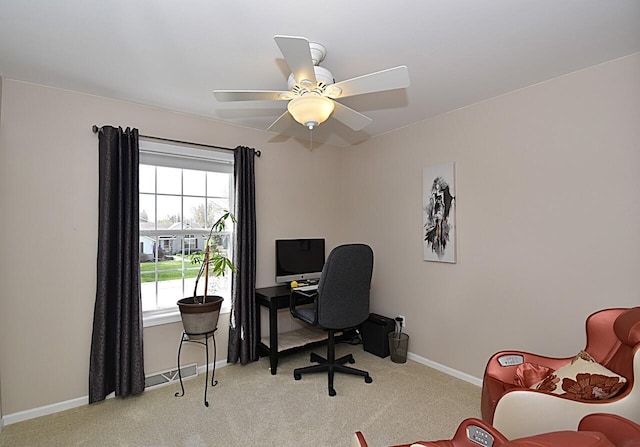 office with baseboards, a ceiling fan, and carpet flooring