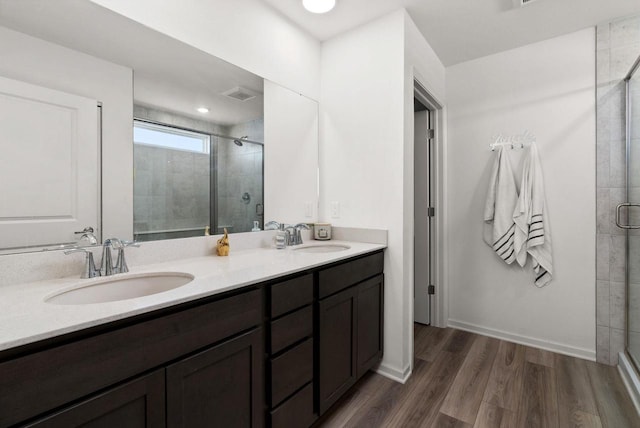 708 Narvik Cir, Stoughton, WI 53589 - full bathroom with a stall shower, a sink, and visible vents