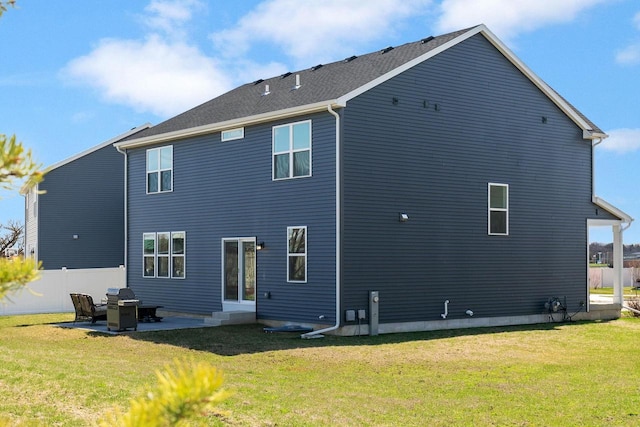 708 Narvik Cir, Stoughton, WI 53589 - back of house featuring a patio area, fence, and a lawn