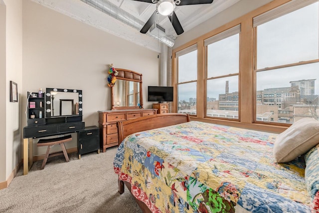 carpeted bedroom with a ceiling fan