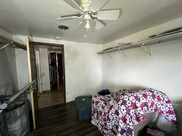 bedroom featuring wood finished floors and a ceiling fan