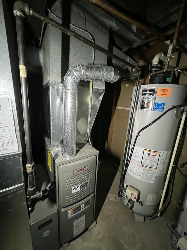 utility room featuring gas water heater