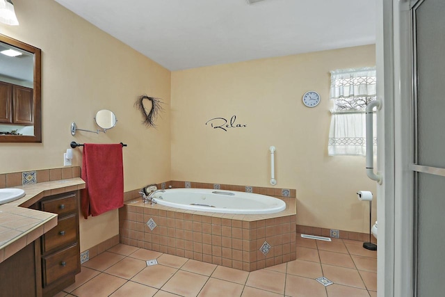 8207 12th St, Kenosha, WI 53144 - full bathroom featuring tile patterned flooring, vanity, and a tub with jets