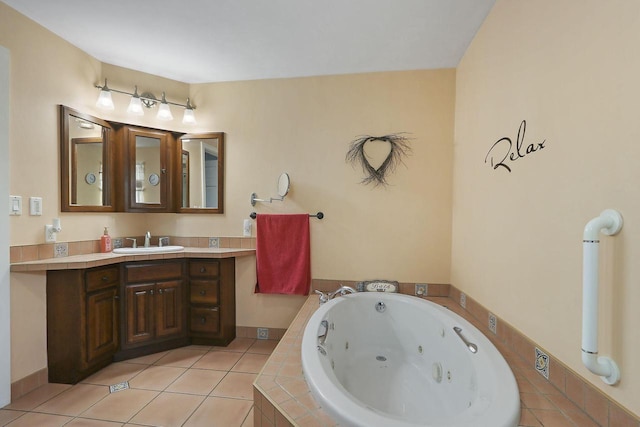 8207 12th St, Kenosha, WI 53144 - bathroom featuring tile patterned flooring, vanity, and a tub with jets