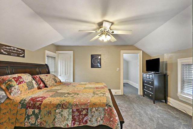 8207 12th St, Kenosha, WI 53144 - carpeted bedroom featuring baseboards, vaulted ceiling, and a ceiling fan