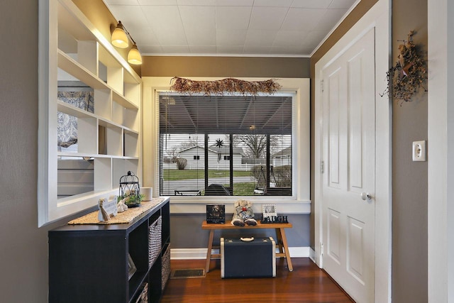 8207 12th St, Kenosha, WI 53144 - interior space with dark wood-style flooring, visible vents, baseboards, and ornamental molding