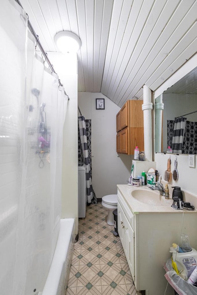 full bathroom featuring washer / clothes dryer, vanity, vaulted ceiling, toilet, and wood ceiling